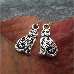 Stylized 3/4" Silver Tone Cat Earrings With Intricate Swirl Design